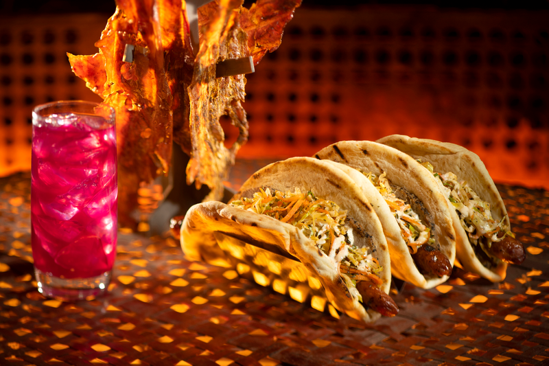 Pictured here, left to right, are the Meiloorun Juice, the Nuna Turkey Jerky and the Ronto Wrap filled with roasted pork, grilled sausage, peppercorn sauce and tangy slaw wrapped in pita found at Ronto Roasters, located in the Black Spire Outpost market.